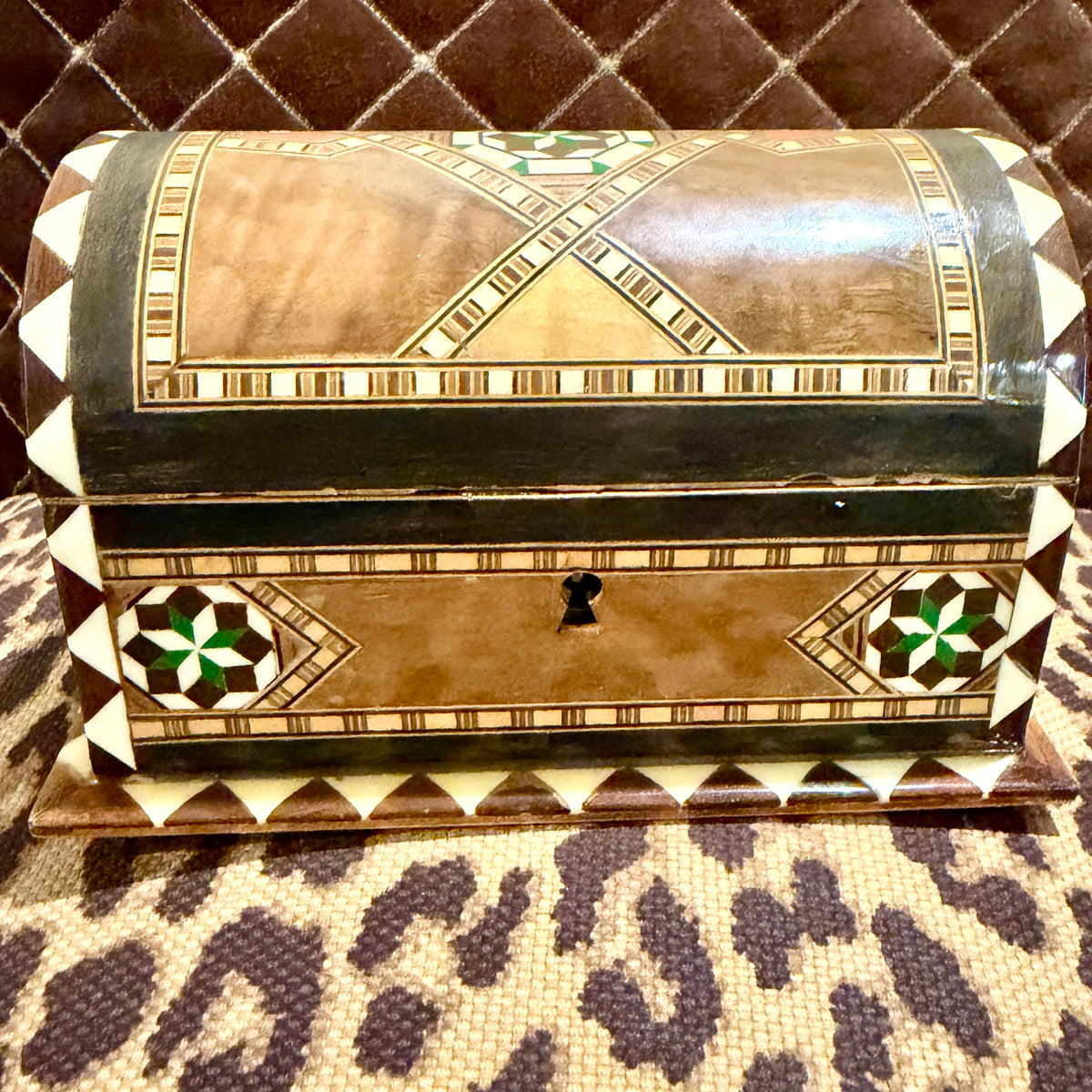 Charming inlaid wood lidded box.