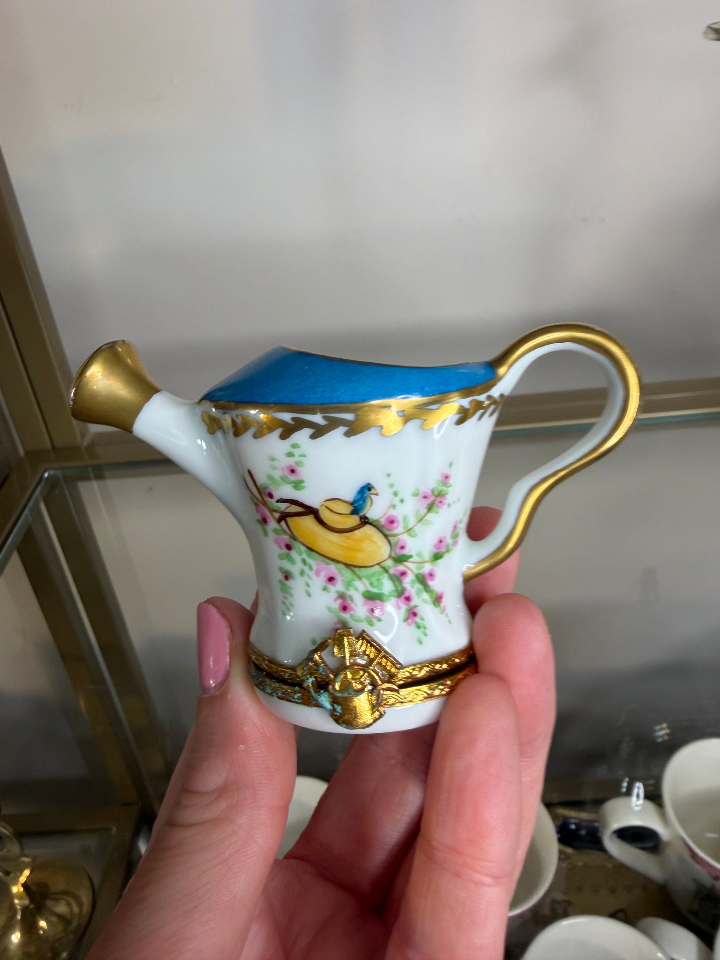 Sweetest handpainted Limoges porcelain watering can trinket box featuring a delicate bird and floral design!