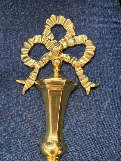 Lovely brass bow sconces with rope and tassel designs pair!