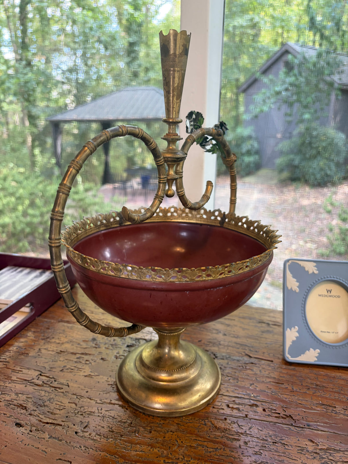 Lovely decorative brass centerpiece bowl or tazza featuring a reddish-maroon enameled body!