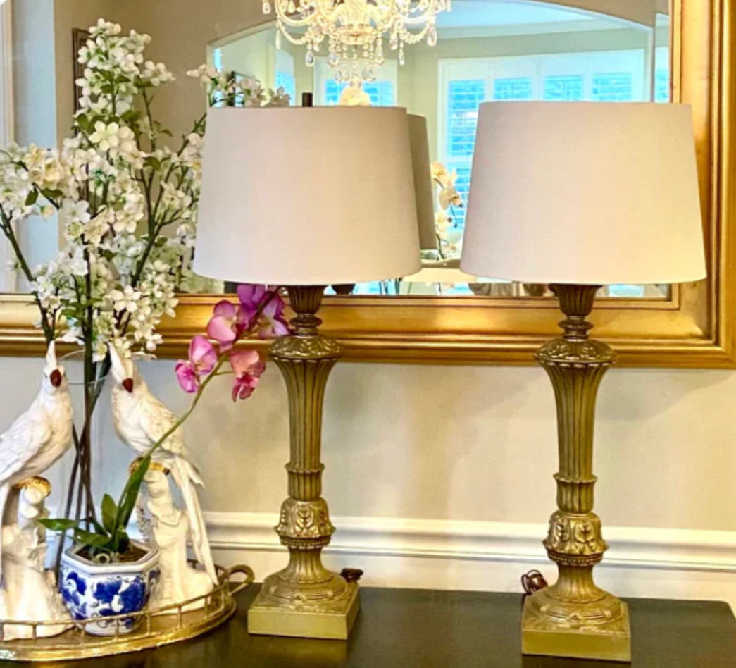 Stunning Pair of vintage neoclassical aged heavy brass lamps.