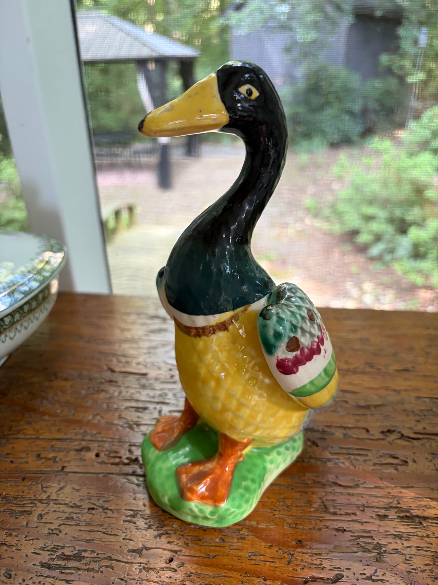 Lovely colorful duck figurine!