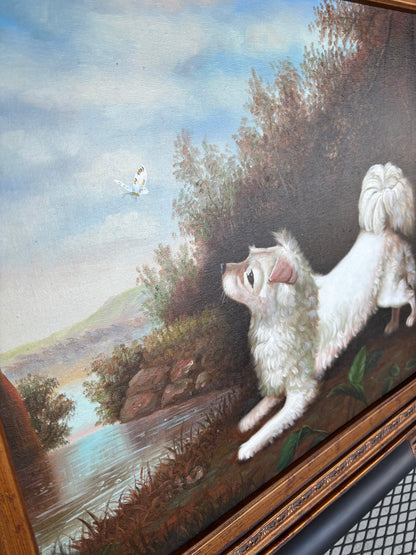 Beautiful signed painting of dog chasing a butterfly in ornate frame!