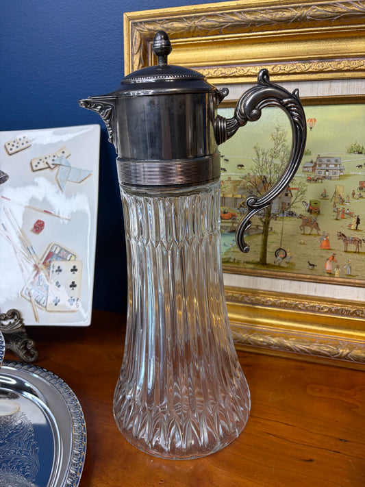 Vintage carafe cut glass pitcher with silver top!