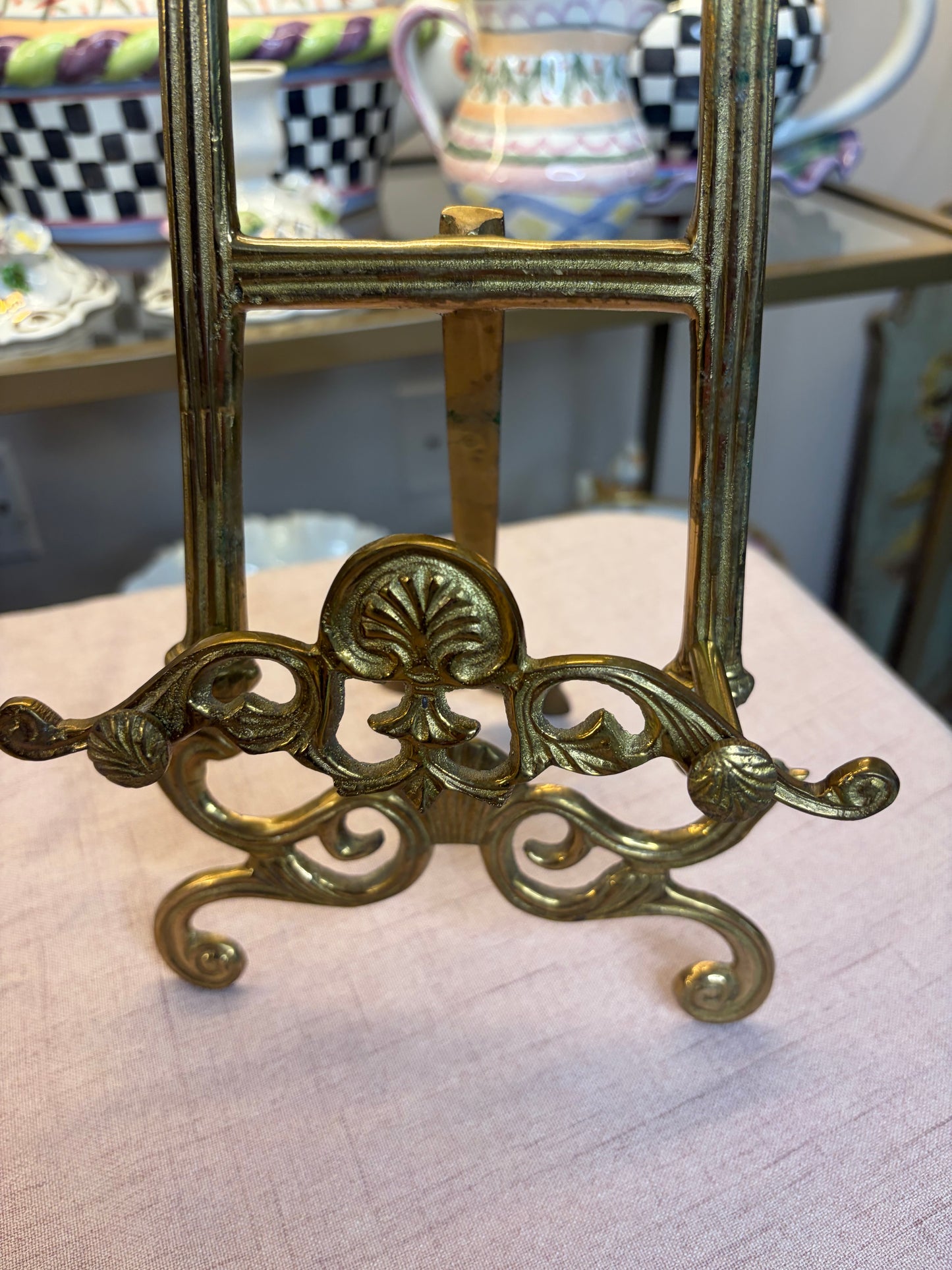 Ornate brass easel with shell motifs!
