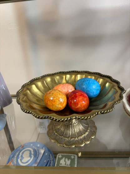 Beautiful brass scalloped pedestal bowl with rope design and intricate base! Includes four alabaster eggs!