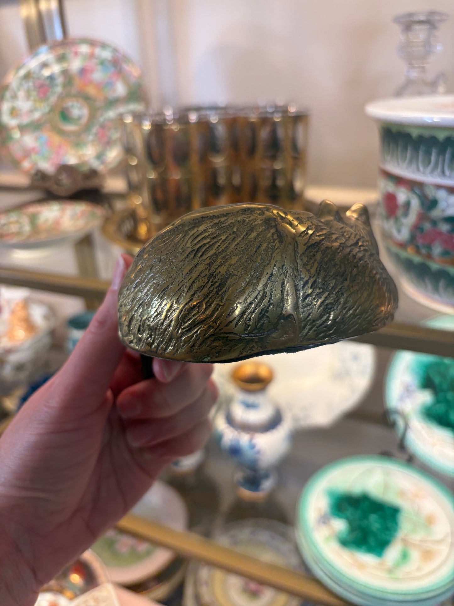 Vintage brass sleeping cat on shelf!