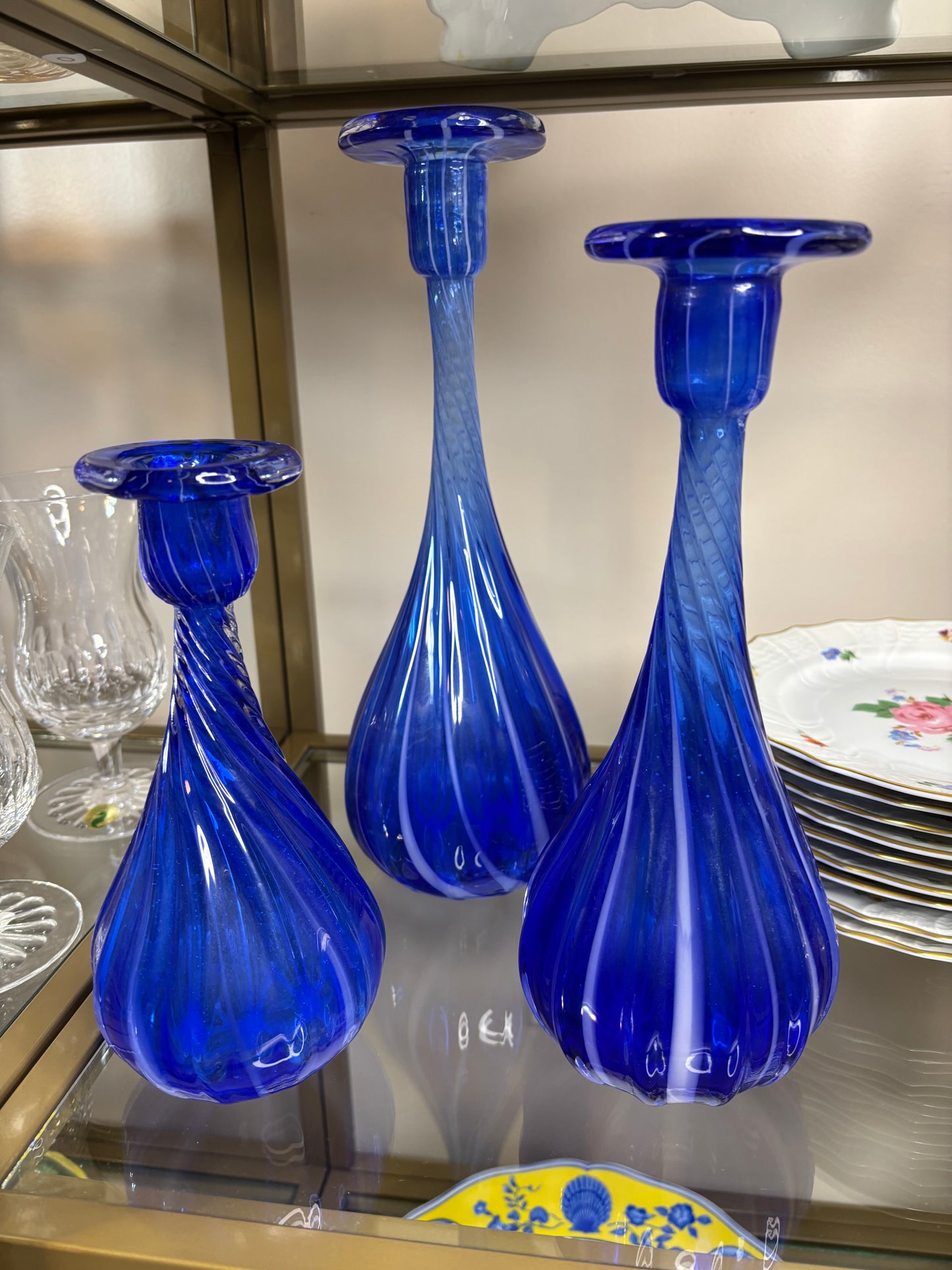Stunning trio of handblown cobalt candleholders/vases with swirl designs and white!