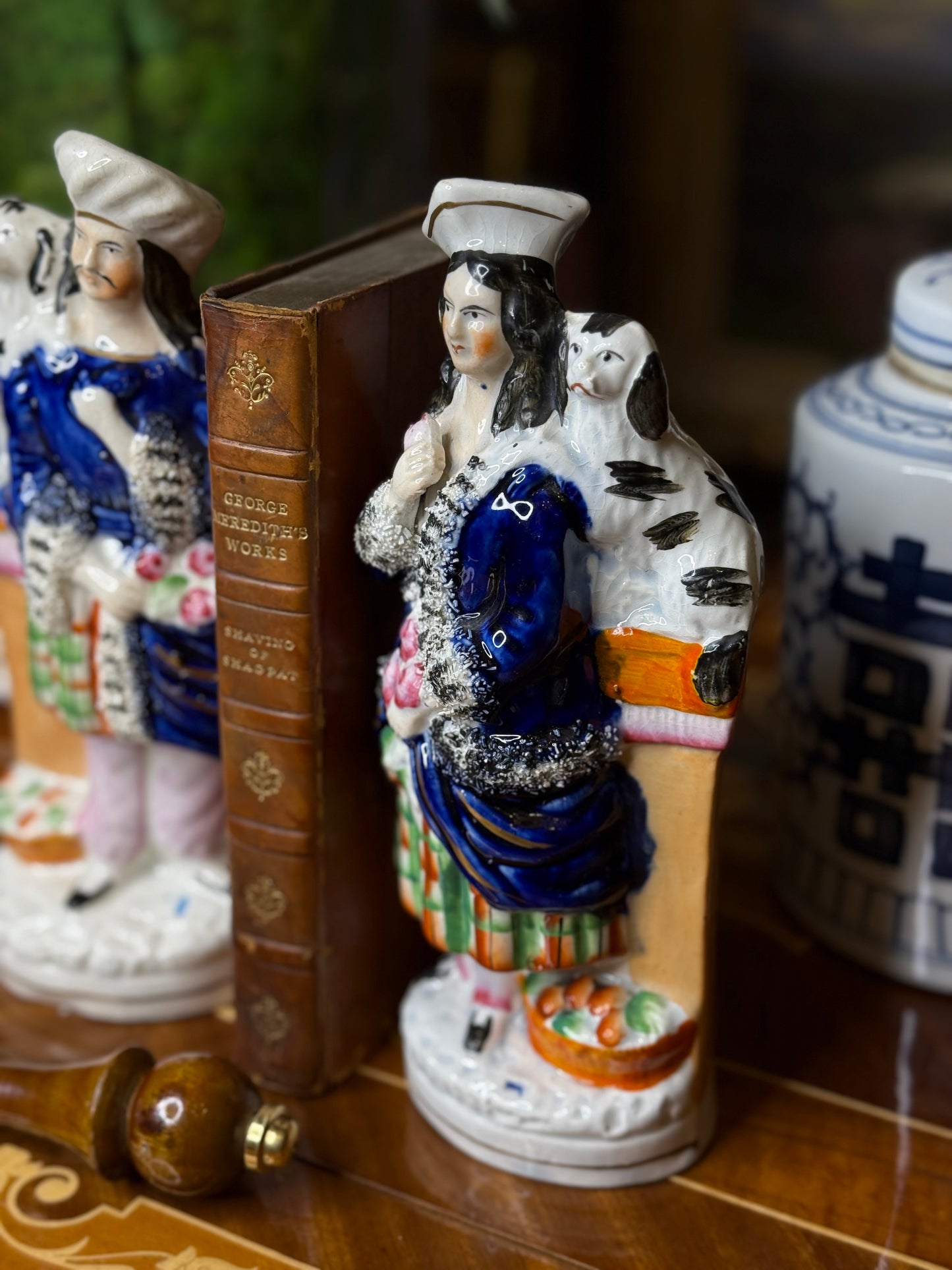 Antique Staffordshire Couple with Spaniel – Hand-Painted Figurines (c. 1860–1880), 9” Tall – Pair