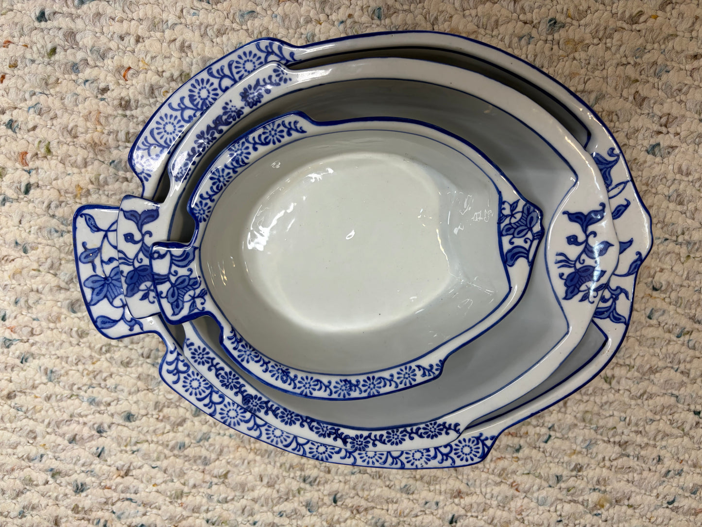 Sweetest nesting fish bowls with blue and white floral designs! As is!