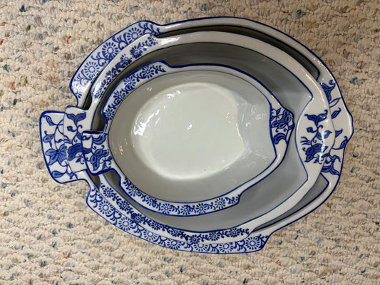 Sweetest nesting fish bowls with blue and white floral designs! As is!