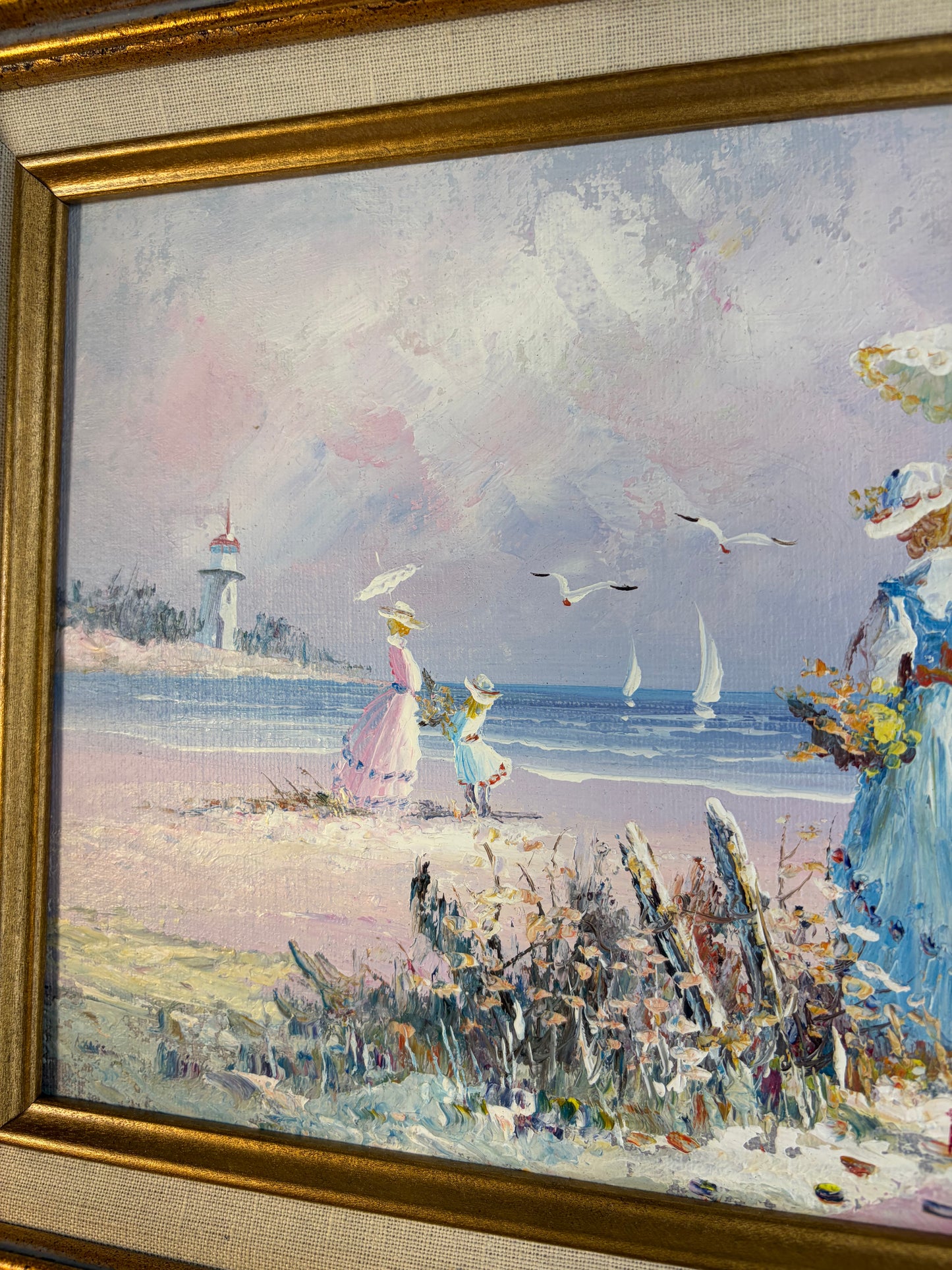 Gorgeous signed and framed art featuring a seaside scene!