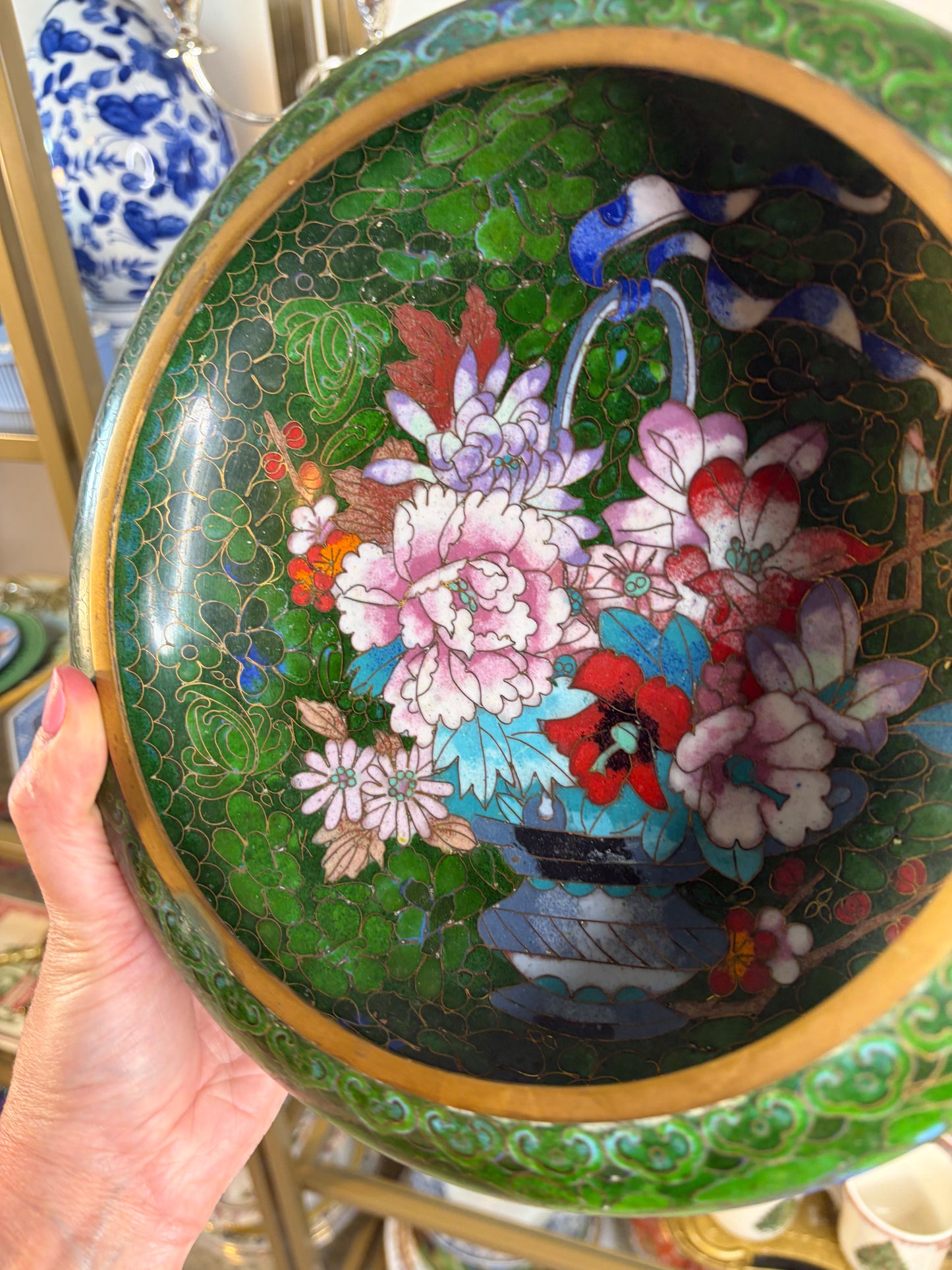 Gorgeous cloisonné green bowl featuring a bouquet and brass rim!