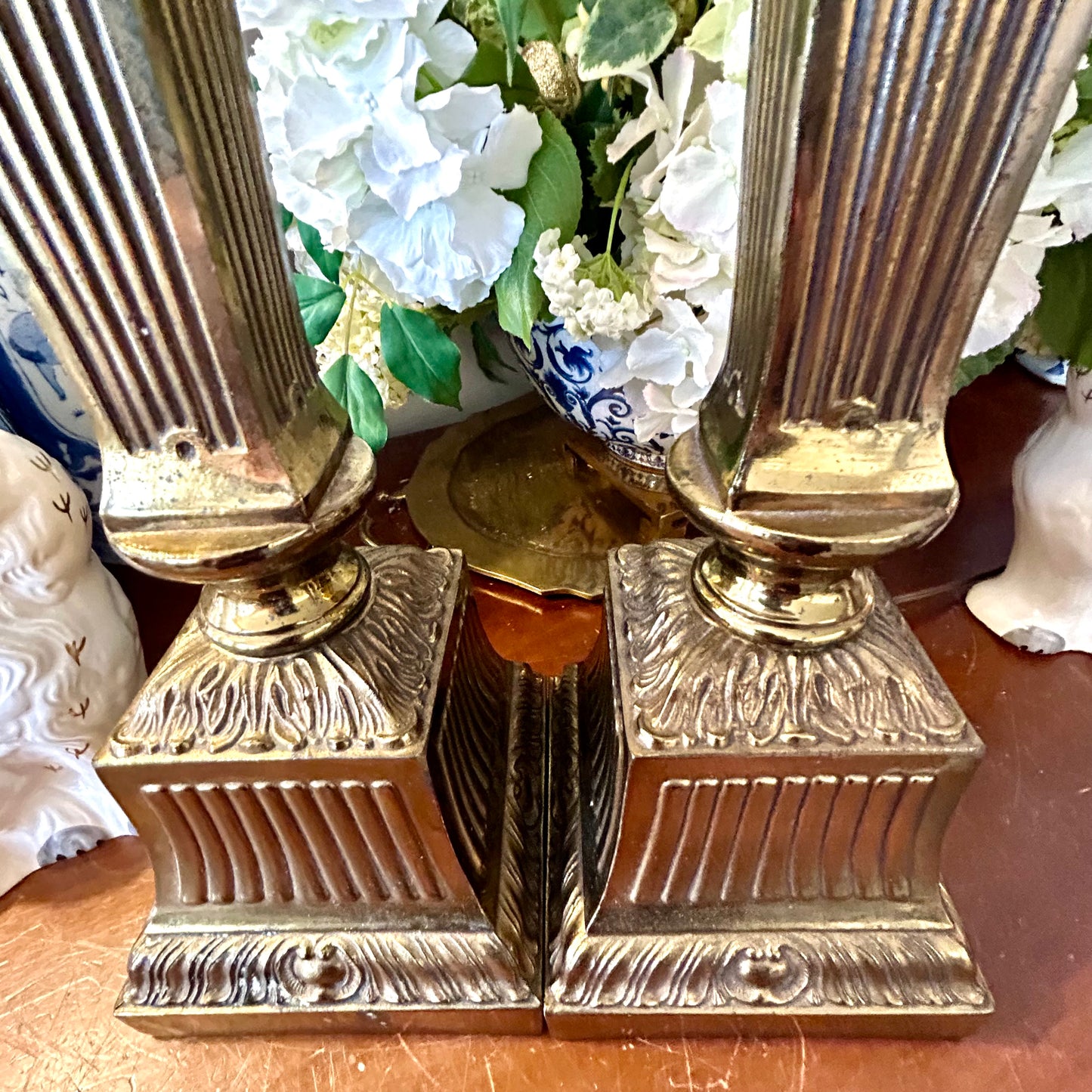 Stunning Pair of vintage neoclassical aged brass lamps.