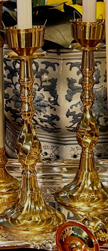 Statuesque vintage shiny brass tall pillar candlestick holders