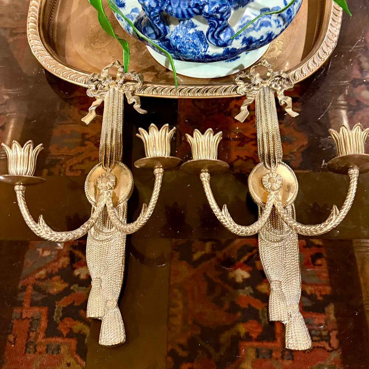 Majestic set of baroque bow & tassel double candle wall sconces
