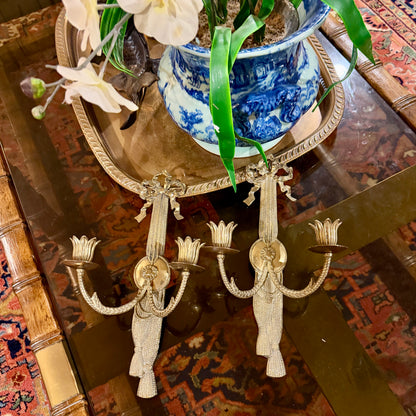 Majestic set of baroque bow & tassel double candle wall sconces