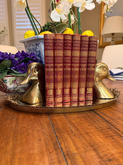 Set of 6 aged French books labeled "Nations of the World France"