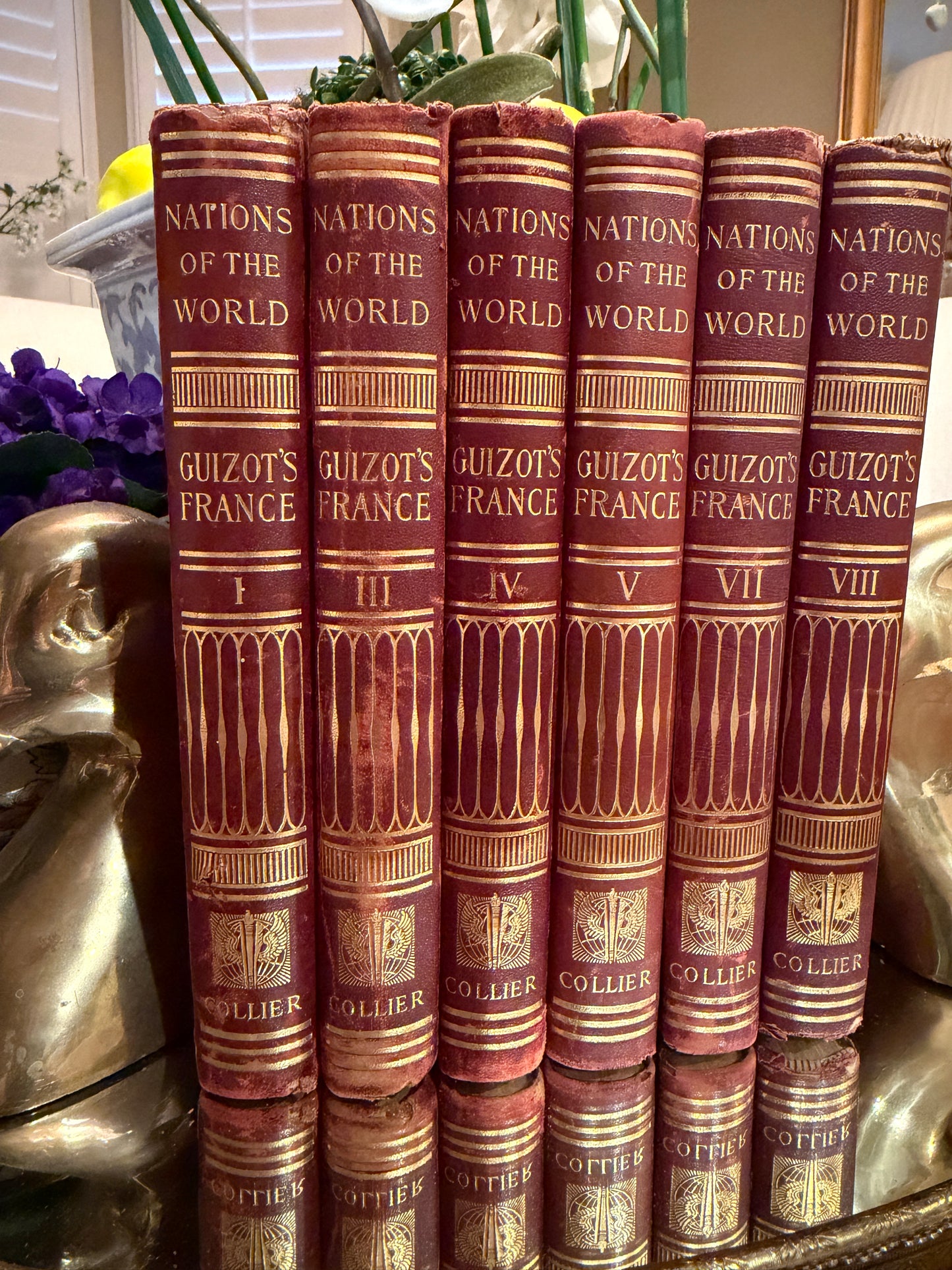 Set of 6 aged French books labeled "Nations of the World France"