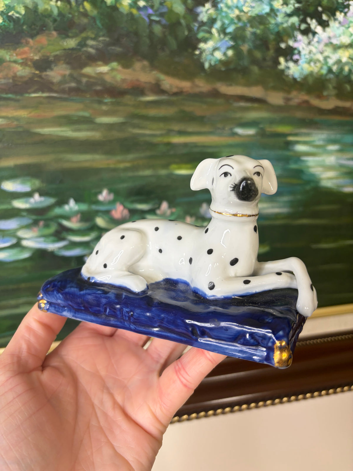 Sweetest Dalmatian dog with crossed paws on cobalt pillow!