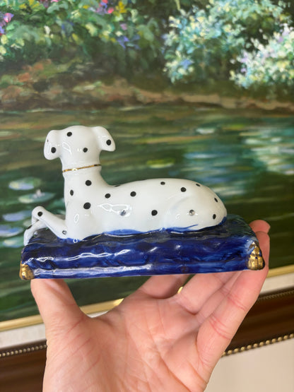 Sweetest Dalmatian dog with crossed paws on cobalt pillow!