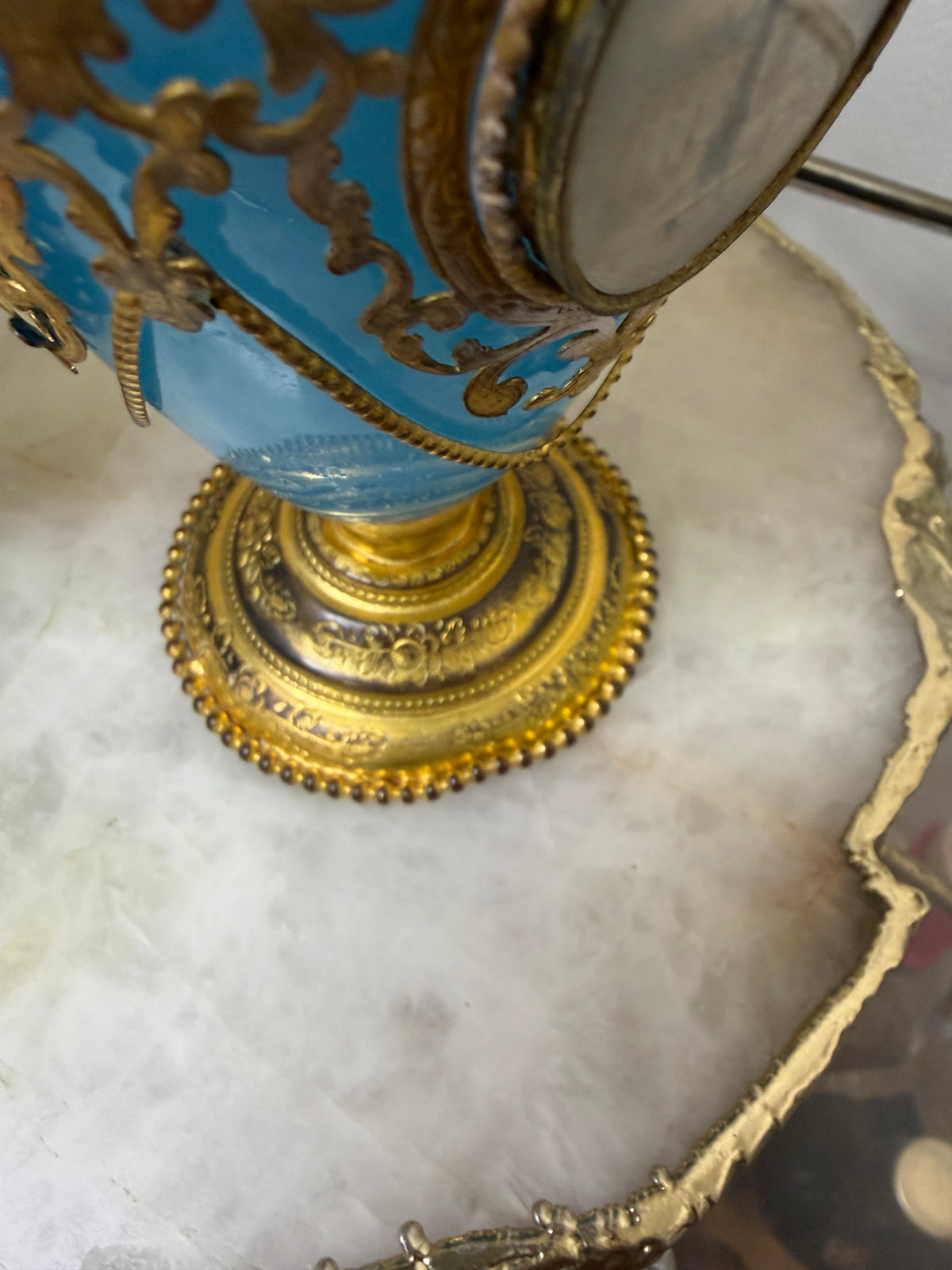 Stunning antique 19th-century French Napoleon III-style blue opaline glass ewer jugs pair adorned with elaborate gilt ormolu (gold-plated bronze) mounts, scrollwork, and scenic medallions! Circa 1836-1850