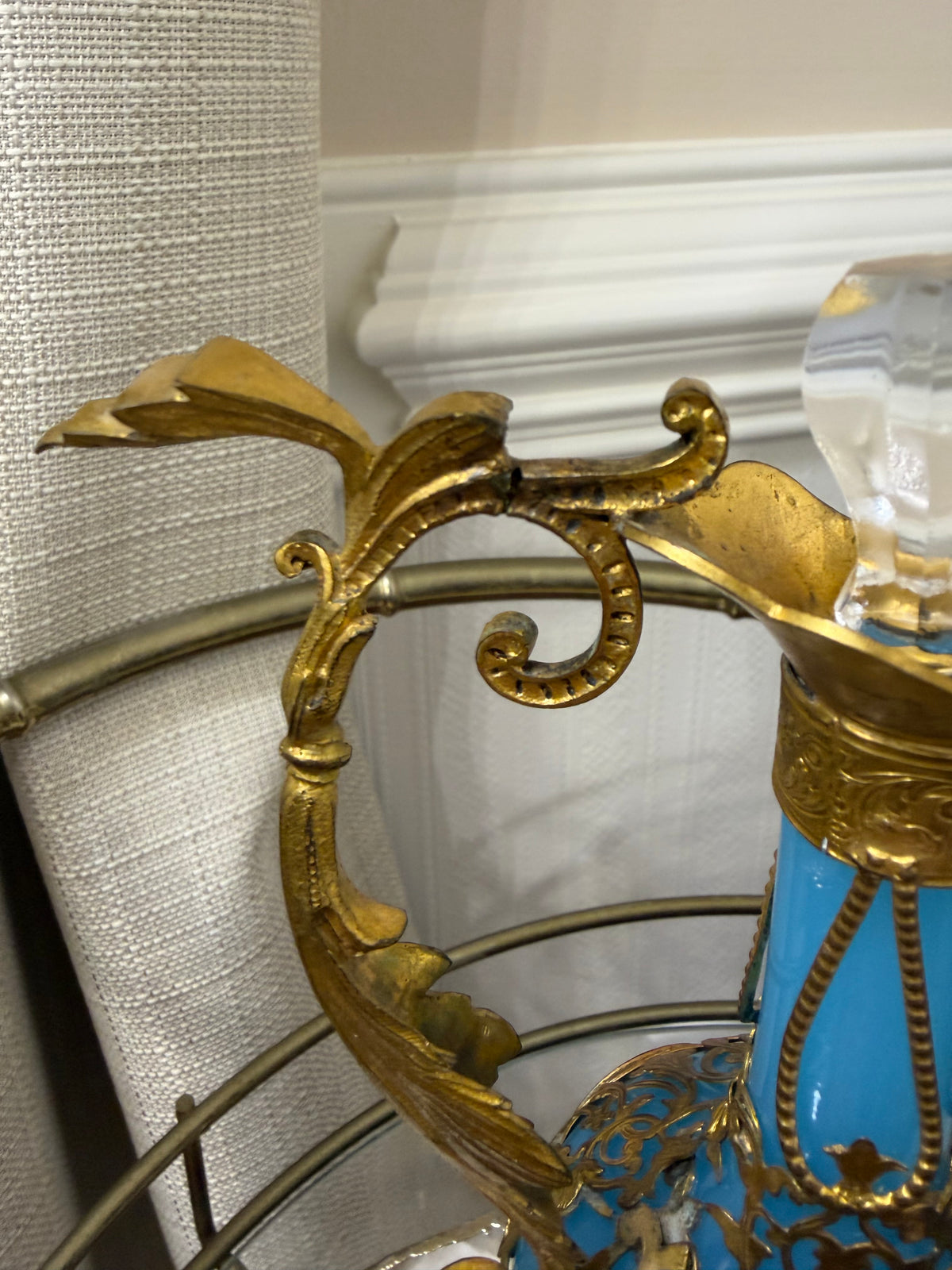 Stunning antique 19th-century French Napoleon III-style blue opaline glass ewer jugs pair adorned with elaborate gilt ormolu (gold-plated bronze) mounts, scrollwork, and scenic medallions! Circa 1836-1850