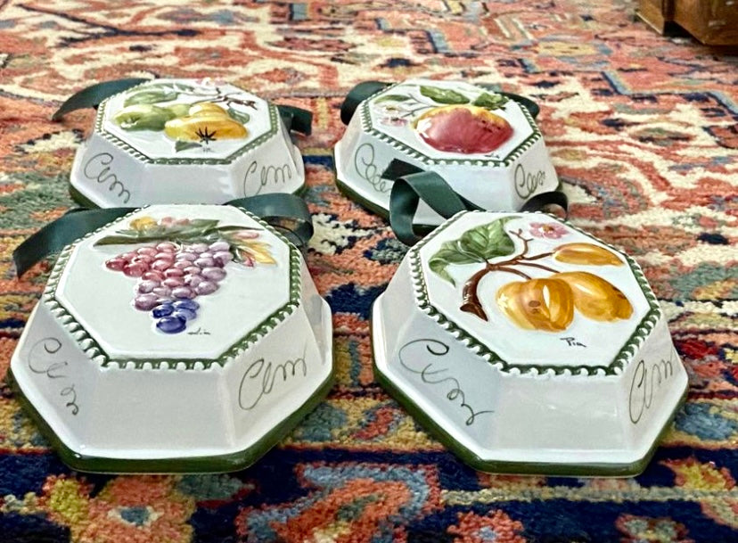 Set of 4 designer CARAFINA Porcelain wall decor plate.