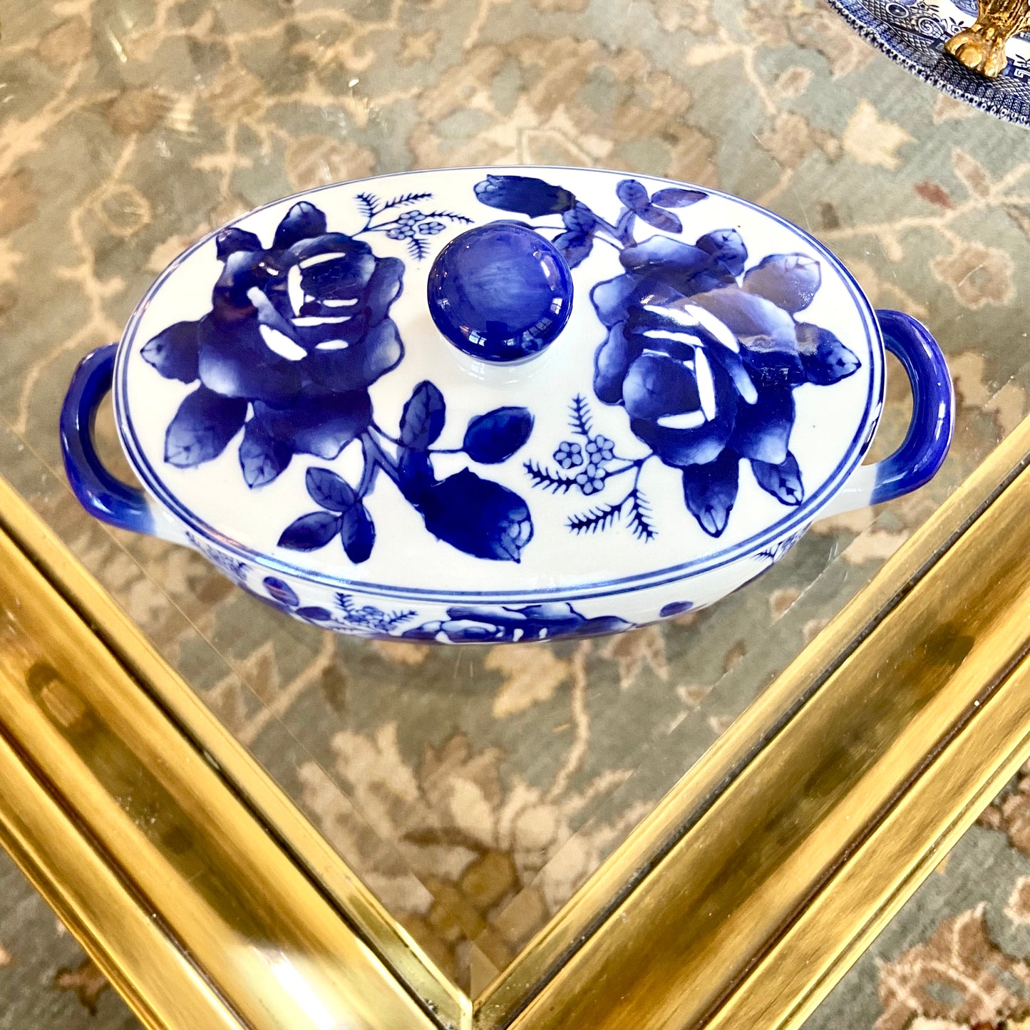 Vintage blue & white floral jar with lid.