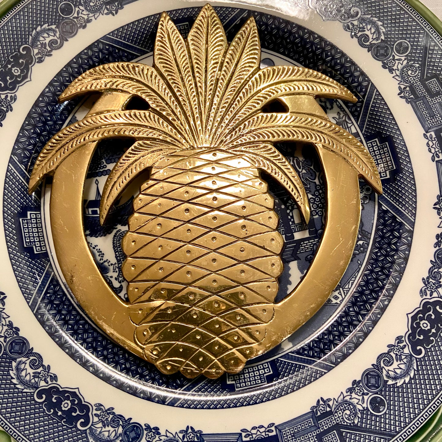 shiny vintage brass pineapples trivet