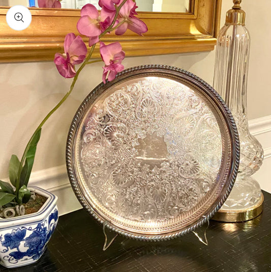 Sparkling vintage silver plate round tray stamped by designer W M Rogers.