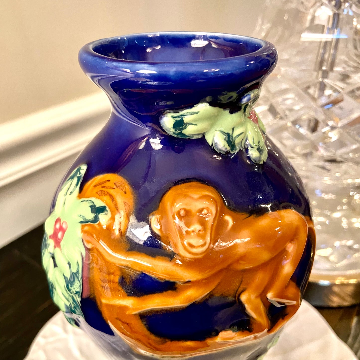 Vintage cobalt blue botanical majolica style monkey vase.