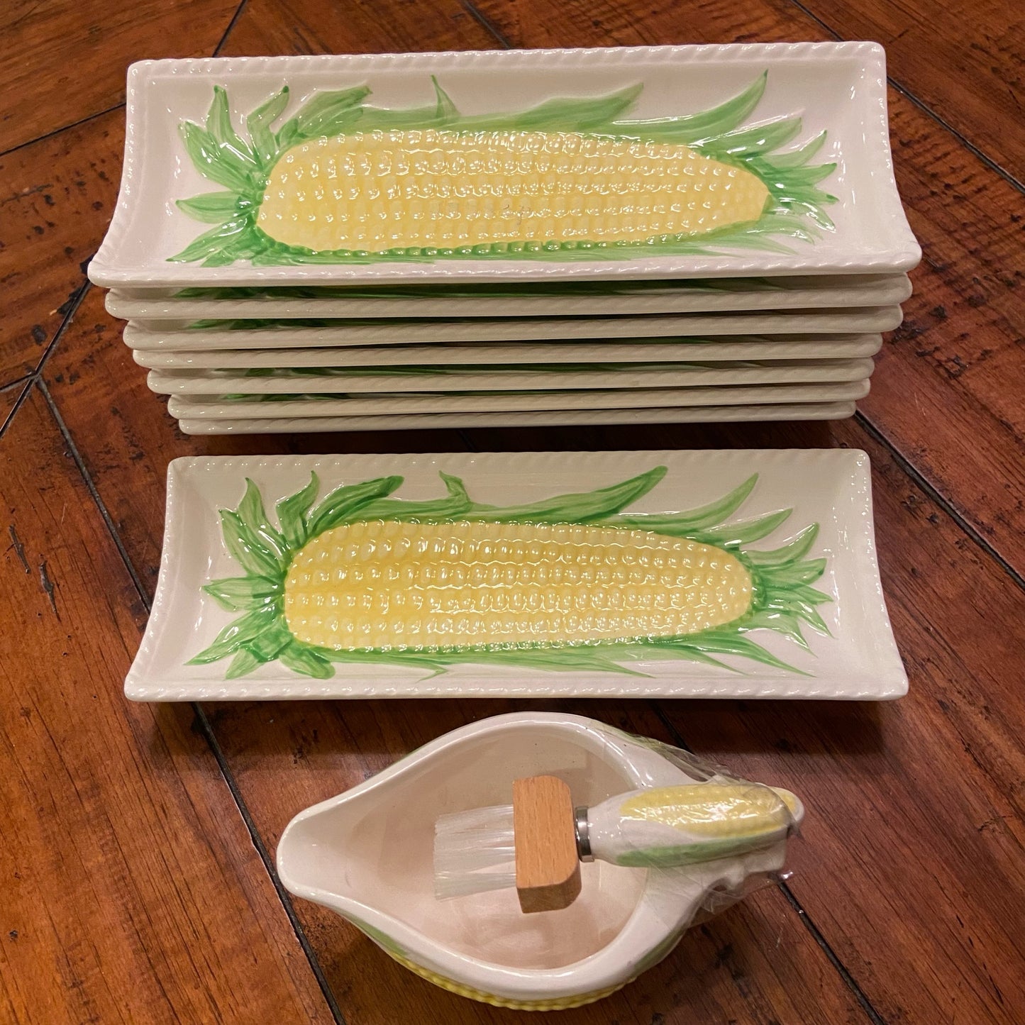 Set of 8 corn on the cob plates with matching warm butter boat with spreader by Lillian Vernon